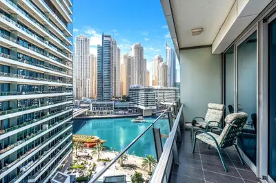 a balcony with a view of the city at Panoramic 1BR Stunning Marina Views Near JBR Beach by Maxx Value Homes in Dubai