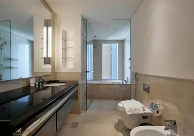a bathroom with a sink and a toilet and a shower at Dubai Marina Residences, Studio with Balcony Connected to Marina Mall in Dubai