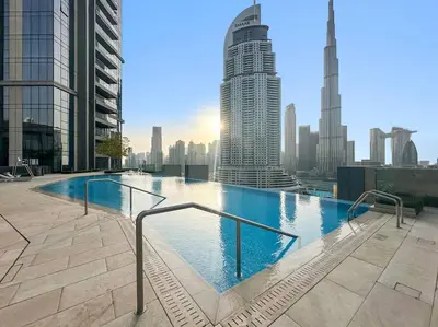 a large swimming pool on top of a building at Modern 2BR with Harbor Views, Pool, & Concierge in Dubai