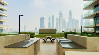 a building with a view of a city skyline at Marina Skyline View & Dubai Harbour Beachfront in Dubai