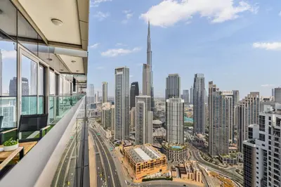a view of a city from the top of a building at High Floor Burj Khalifa & Sea View with stunning Infinity Pool in Dubai