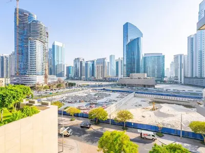 a view of a city with tall buildings at Modern Downtown Escape 1Bedroom with Upscale Comfort in Dubai