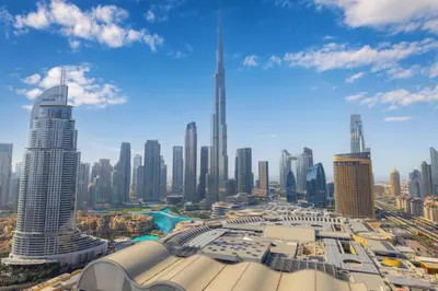 a view of a city with tall buildings at The Address Fountain Views - Residence 2 Bedroom with Burj Khalifa view in Dubai