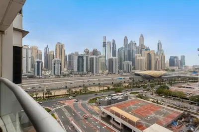 a view of a city with a highway and buildings at Stylish Studio in Prime Location in Dubai