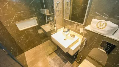 a bathroom with a sink and a shower at Magnificent studio-One of kind in Dubai in Dubai