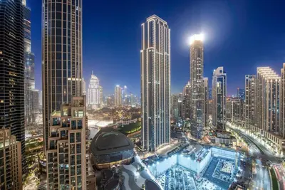 a view of a city skyline with tall buildings at FIRST CLASS 2BR Stunning Fountain View in Dubai