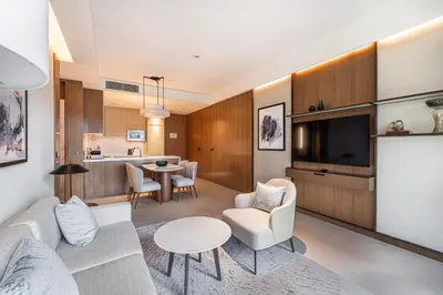 a living room with a couch and a table at Luxury 1BR The Address Opera, Downtown Dubai in Dubai