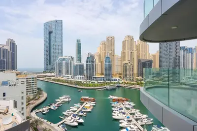 a view of a harbor with boats in a city at Livbnb - Sea and Marina View, Steps to Marina Walk in Dubai
