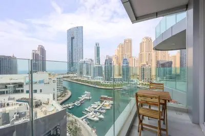 a balcony with a view of a harbor at Livbnb - Sea and Marina View, Steps to Marina Walk in Dubai