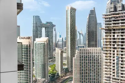 a view of a city skyline with tall buildings at Burj Crown - New Sky High, Near Burj Khalifa, Boulevard View, Opposite Dubai Mall in Dubai