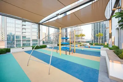 a playground in a building with large windows at Burj Crown - New Sky High, Near Burj Khalifa, Boulevard View, Opposite Dubai Mall in Dubai