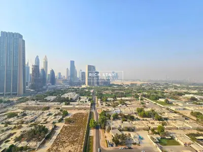 an aerial view of a city with tall buildings at Incredible 1BR, Downtown Views II near Dubai Mall in Dubai