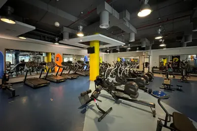 a gym with lots of treadmills and machines at Luxury Living on the Top Floor Full Marina View in Dubai