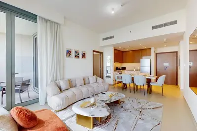 a living room with a couch and a table at 5242 Tower 2 - Cosy One Bedroom in Dubai