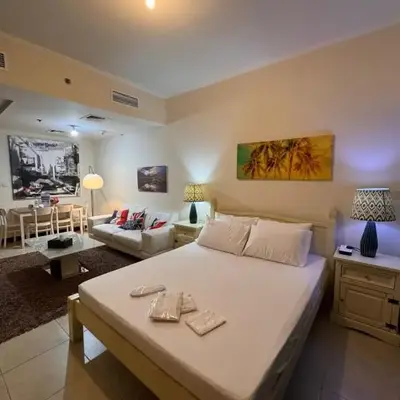 Click Stay - JLT - Entire Studio & Balcony Lakes view Apartment -AM
