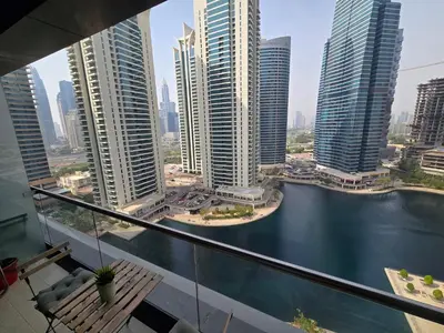 a view of the city from a balcony in a building at Click Stay - JLT - Entire Studio & Balcony Lakes view Apartment -NA in Dubai