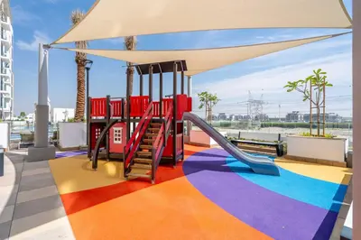 a playground with a slide on a roof at GuestReady - Urban Retreat in Downtown in Dubai