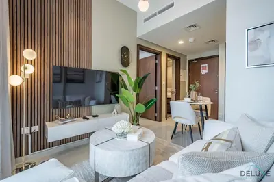 a living room with a couch and a table at Exclusive Rate 1BR with Partial Burj Khalifa Views by Deluxe Holiday Homes in Dubai