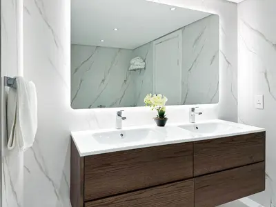 a bathroom with a sink and a mirror at Charming Ocean View 1BR Apartment at 5 Star Resort in Dubai