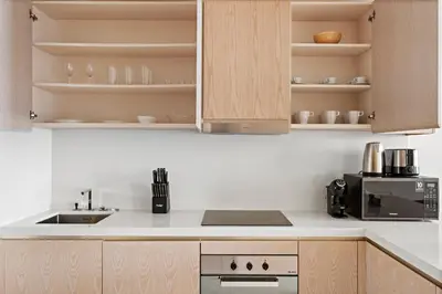 a kitchen with a sink and a microwave at Stonetree - Full Sea View - Luxury Tower with 5 Star Facilities in Dubai