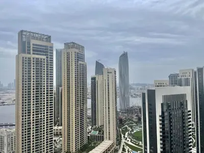 a group of tall buildings in a city at High Floor, 1 Bedroom in Palace Residence in Dubai