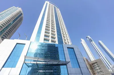 a tall building with a blue sky in the background at RH - Best location, 01 BR Spacious, walk to burj in Dubai
