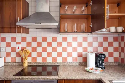 a kitchen with a counter top with a coffee maker at Silkhaus Metro Close To Barsha Heights in Dubai