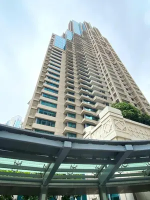 a large apartment building with a tall building at Silkhaus Modern 1 BDR With Easy Access to Downtown in Dubai