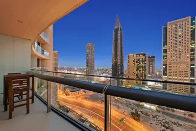 a balcony with a view of a city skyline at Luxury 1BR Skyline & Sea Views Walk to Dubai Mall & Burj Khalifa in Dubai
