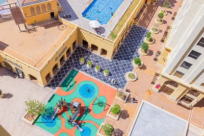 an overhead view of a swimming pool with a horse statue at Sound of the Waves in JBR by Lagom in Dubai