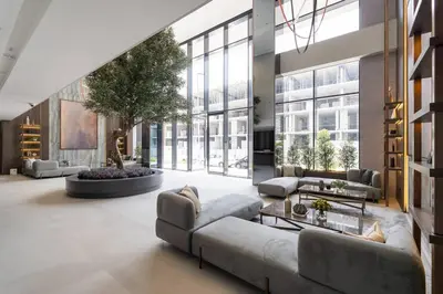 a large living room with a couch and a table at New Listing * Pool & Marina Skyline View * TOP Amenities in Dubai