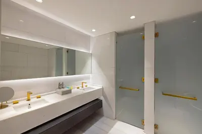 a bathroom with a sink and a shower at FIVE Palm Luxury 1BR Apartment with Stunning Views in Dubai