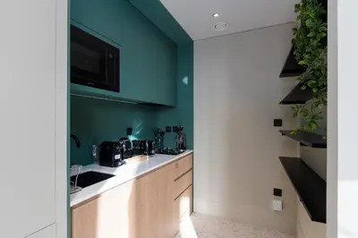 a kitchen with a sink and a counter top at Upside Living, Burj Khalifa View, Business Bay - Mint Stay in Dubai
