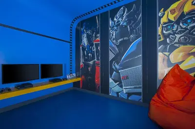a room with a room with a wall with a mural at DAMAC Maison Cour Jardin in Dubai