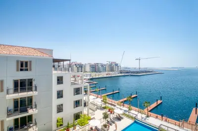 a view of a body of water from a building at The Smart Concierge - La Rive Port De Lamer in Dubai