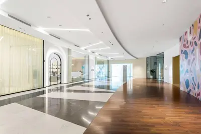 a hallway of a building with a hard wood floor at Khalifa Views & Direct Mall Access in Burj Vista in Dubai