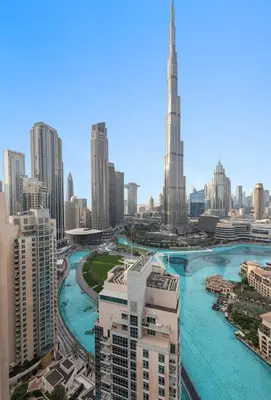 a view of a city with a river and buildings at FIRST CLASS 2BR Incredible Burj Khalifa View in Dubai