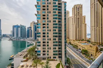 a view of a city with tall buildings and a river at Beautiful 2BR apartment in Al Sahab 2, Dubai Marina by Deluxe Holiday Homes in Dubai