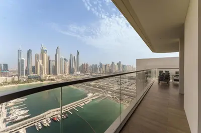 a balcony with a view of a city at Maison Privee - Exclusive Apt w/ Unmatched Dubai Marina Vistas in Dubai