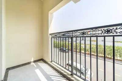a balcony with a view of a street at Studio Apartment in Resotz Residence Arjan - Close to Miracle Garden in Dubai