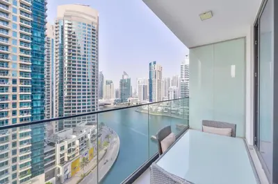 an apartment balcony with a view of the city at Luxury Living in Marina Liv Residence 2BR in Dubai