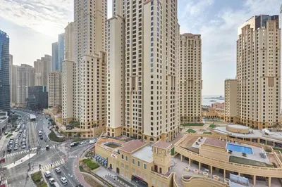 an aerial view of a city with tall buildings at Luxury Living in Marina Liv Residence 2BR in Dubai