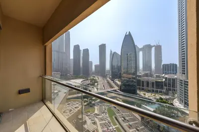 a room with a view of a city at Maison Privee - Fabulous Studio with Direct Burj Khalifa Views in Dubai