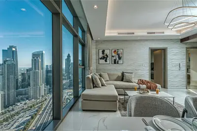 a living room with a view of a city at Highest infinity Pool in Downtown Dubai in Dubai