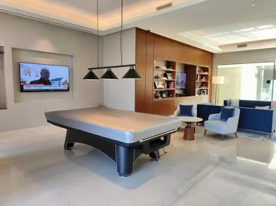 a hospital room with a bed and a tv at Luxury of 1 minute walk to Burj Khalifa & D/Opera in Dubai
