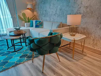 a living room with a couch and two tables at Waterfront Marina Best View Amazing Location 2 Bed in Dubai