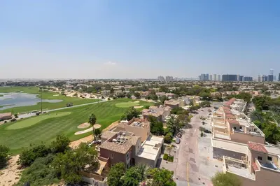 an aerial view of a golf course at a resort at Luxury Studio - Golf Views - Sports City Dubai in Dubai