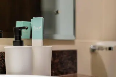a toothbrush holder on a counter in a bathroom at Luxury Studio - Golf Views - Sports City Dubai in Dubai