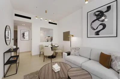 a living room with a couch and a table at Experience Serenity at Binghatti Crest in JVC in Dubai