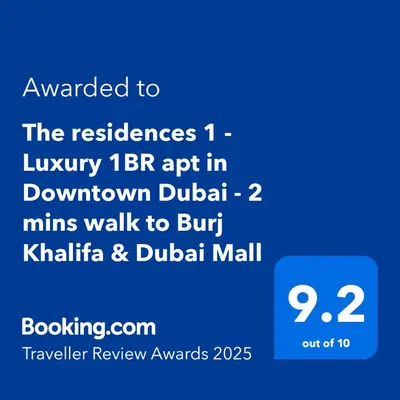 a screenshot of a cell phone with the text upgraded to the reserves luxury br at The residences 1 - Luxury 1BR apt in Downtown Dubai - 2 mins walk to Burj Khalifa & Dubai Mall in Dubai